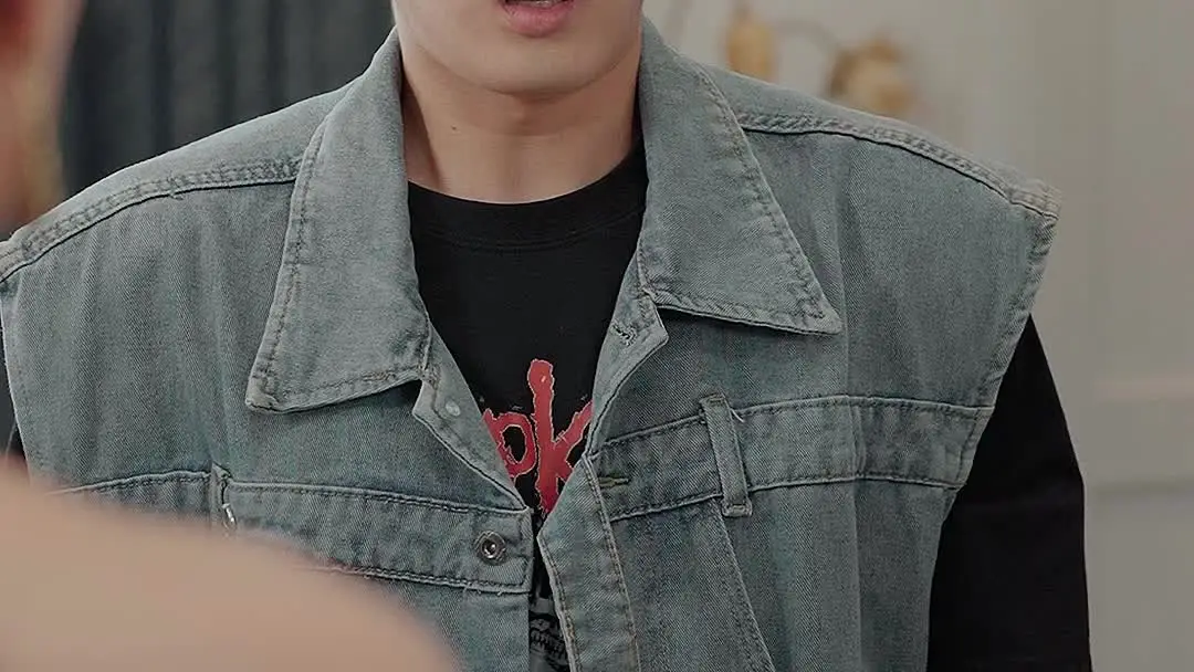 The Three of Us: When a Denim Vest Hides a Fractured Identity