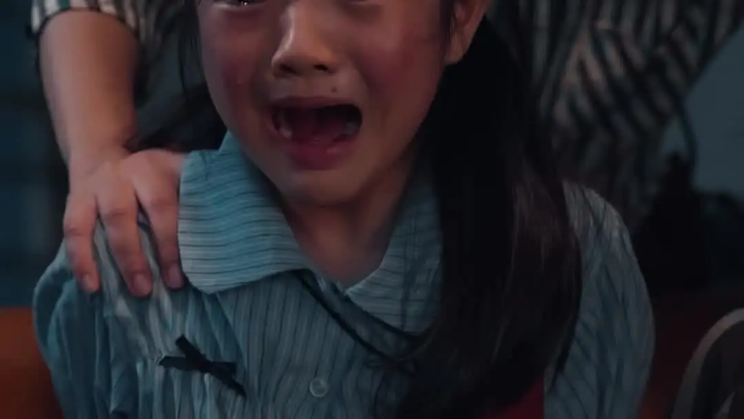 To Mom's Embrace: Where Blood Stains the Red Envelope